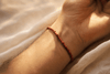 Red String Bracelet Meaning: Protection, Luck, and the Traditions Behind the Thread Buddha Tibet