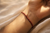 Red String Bracelet Meaning: Protection, Luck, and the Traditions Behind the Thread