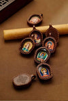 Hand-Painted Tsatsa Pendant — Miniature Tibetan Buddhist Guardian in Leather Frame Buddha Tibet