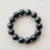 Natural Rainbow Obsidian Bracelet — Volcanic Stone That Shows Its Colors in the Light