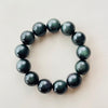 Natural Rainbow Obsidian Bracelet — Volcanic Stone That Shows Its Colors in the Light