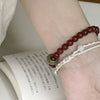 Red Agate & Jadeite Running Ring Bracelet — A Loose Green Ring on a Red Strand