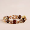 Black Gold Super Seven Crystal Bracelet — Premium Rutilated Quartz