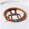 Buddha Tibet Olive Pit Talisman - Turquoise, Dzi & Cinnabar