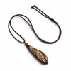 Buddha Tibet Agarwood Faceless Buddha Pendant - Lotus & Sutras Buddha Tibet