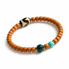 Buddha Tibet Olive Pit Talisman - Turquoise, Dzi & Cinnabar Buddha Tibet