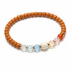 Buddha Tibet Olive Pit Talisman - Turquoise, Dzi & Cinnabar Buddha Tibet