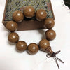 Golden Silk Sandalwood Mala Bracelet — Natural Wood Beads with Carved Blessing Pendant Buddha Tibet