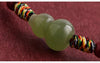 Hetian-Jade-Kürbis-Armband – Roter Faden mit Zinnober-Glücksperle