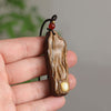 Buddha Tibet Agarwood Faceless Buddha Pendant - Lotus & Sutras