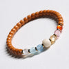 Buddha Tibet Olive Pit Talisman - Turquoise, Dzi & Cinnabar