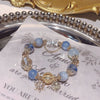 Clear Quartz Bow Bracelet — Delicate Bead Bracelet with Snow Crystal Charm - Buddha Tibet