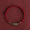 Hetian-Jade-Kürbis-Armband – Roter Faden mit Zinnober-Glücksperle