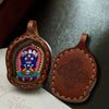 Hand-Painted Tsatsa Pendant — Miniature Tibetan Buddhist Guardian in Leather Frame Buddha Tibet