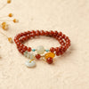 Red Agate Double-Loop Bracelet — Peace Knot, Worn in Two Strands