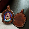 Hand-Painted Tsatsa Pendant — Miniature Tibetan Buddhist Guardian in Leather Frame Buddha Tibet