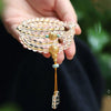 Yellow Jambhala 108-Bead White Crystal Mala Bracelet — Clear Quartz & Sandalwood for Wealth Practice Buddha Tibet