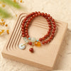 Red Agate Double-Loop Bracelet — Peace Knot, Worn in Two Strands