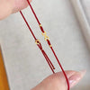 Gold Möbius Red String Bracelet — Adjustable Luck Charm for the Year of Your Birth - Möbius Ring — Red Cord, AdjustableBuddha Tibet
