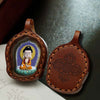 Hand-Painted Tsatsa Pendant — Miniature Tibetan Buddhist Guardian in Leather Frame Buddha Tibet