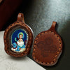 Hand-Painted Tsatsa Pendant — Miniature Tibetan Buddhist Guardian in Leather Frame Buddha Tibet