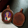Hand-Painted Tsatsa Pendant — Miniature Tibetan Buddhist Guardian in Leather Frame Buddha Tibet