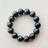 Natural Rainbow Obsidian Bracelet — Volcanic Stone That Shows Its Colors in the Light - Buddha Tibet xd001104