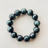 Natural Rainbow Obsidian Bracelet — Volcanic Stone That Shows Its Colors in the Light - Buddha Tibet xd001105