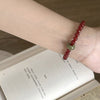 Red Agate & Jadeite Running Ring Bracelet — A Loose Green Ring on a Red Strand - 8mm with Running RingBuddha Tibet