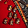 Tibetan Dual-Sided Tsa-Tsa Pendant — Hand-Painted Deity & Guardian Pairs in Leather Casing Buddha Tibet