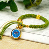 Tibetan Fortune Eye Braided Bracelet — Woven Lucky Cord with Dharma Eye Charm & Prayer Wheel Bead Buddha Tibet