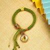 Tibetan Fortune Eye Braided Bracelet — Woven Lucky Cord with Dharma Eye Charm & Prayer Wheel Bead Buddha Tibet